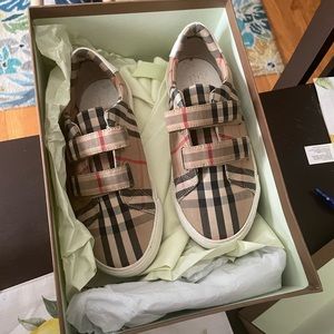Kids Burberry shoes only worn once just for special occasions.